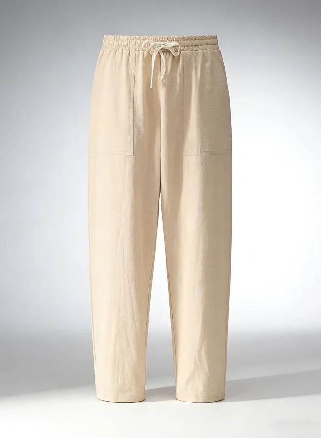 تايك تو بنطال سادة بنسيج بارز ورباط خصر